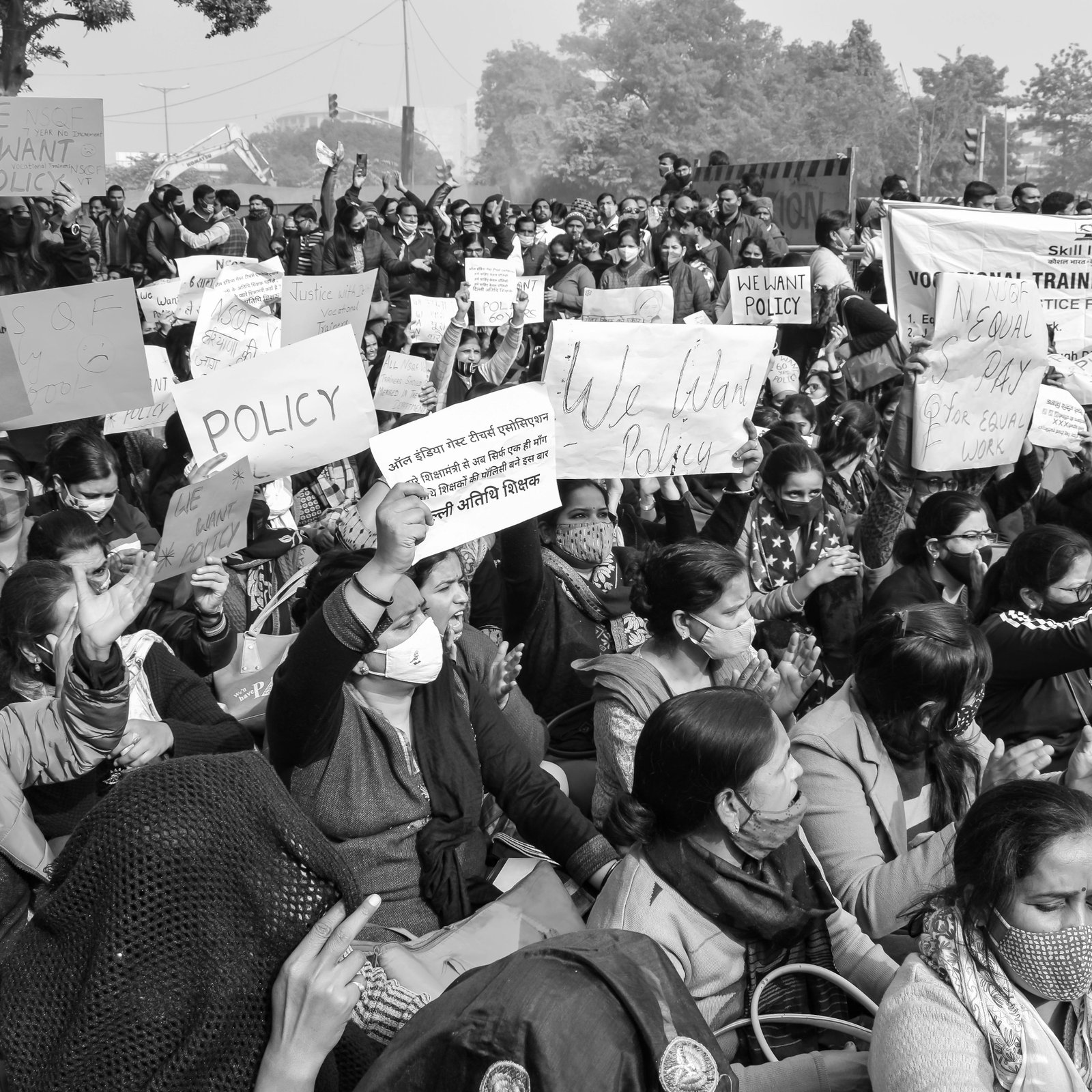 Awareness rally in India with community members holding placards